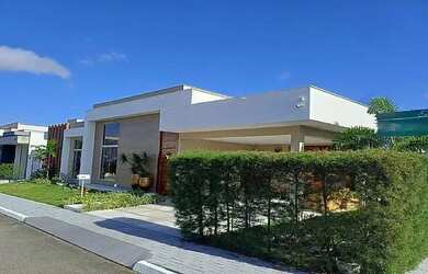 Imagem: A casa possui 4 Dormitórios, 4 Banheiros, 2 Vagas na garagem