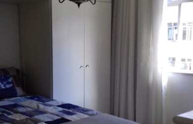 Imagem: O apartamento possui 3 Dormitórios, 1 Banheiro, 2 Vagas na