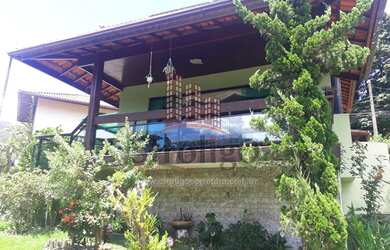 Imagem: A casa em condomínio possui 4 Dormitórios, 4 Banheiros, 2