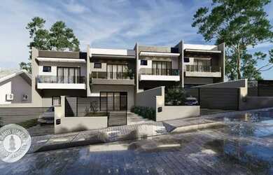 Imagem: A casa possui 3 Dormitórios, 2 Banheiros, 2 Vagas na garagem