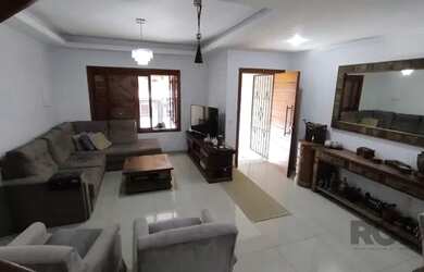 Imagem: A casa possui 3 Dormitórios, 4 Banheiros, 3 Vagas na garagem