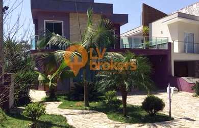 Imagem: A casa em condomínio possui 4 Dormitórios, 4 Banheiros, 5