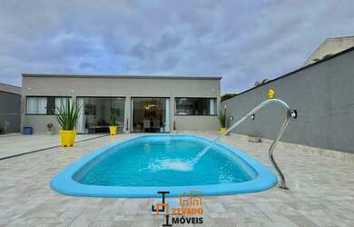 Imagem: A casa possui 5 Dormitórios, 4 Banheiros, 4 Vagas na garagem