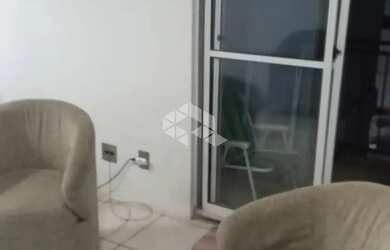 Imagem: O apartamento possui 3 Dormitórios, 1 Banheiro, 1 Vaga na garagem