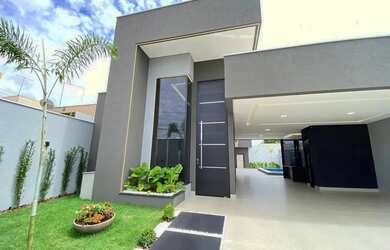 Imagem: A casa possui 3 Dormitórios, 5 Banheiros, 3 Vagas na garagem