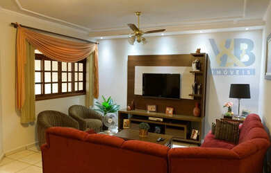 Imagem: A casa possui 3 Dormitórios, 3 Banheiros, 3 Vagas na garagem