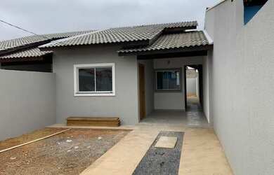 Imagem: A casa possui 2 Dormitórios, 1 Banheiro, 2 Vagas na garagem