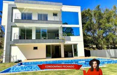 Imagem: A casa em condomínio possui 5 Dormitórios, 5 Banheiros, 5