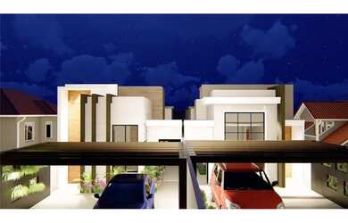 Imagem: A casa possui 3 Dormitórios, 2 Banheiros, 2 Vagas na garagem