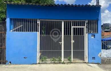 Imagem: A casa possui 2 Dormitórios, 1 Banheiro, 2 Vagas na garagem