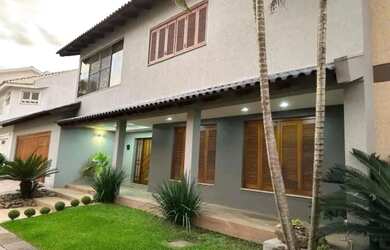 Imagem: A casa em condomínio possui 3 Dormitórios, 4 Banheiros, 3