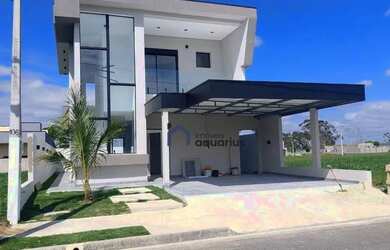 Imagem: A casa em condomínio possui 4 Dormitórios, 5 Banheiros, 4