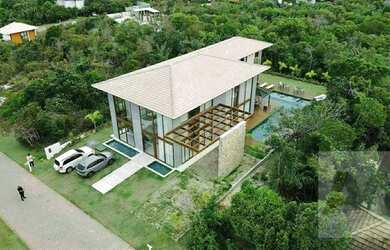 Imagem: A casa possui 5 Dormitórios, 5 Banheiros, 4 Vagas na garagem