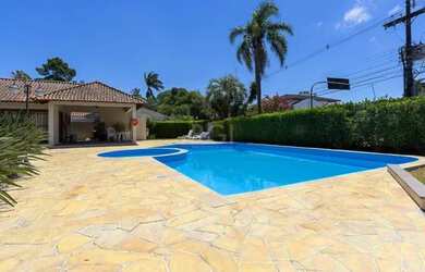 Imagem: A casa em condomínio possui 3 Dormitórios, 4 Banheiros, 3