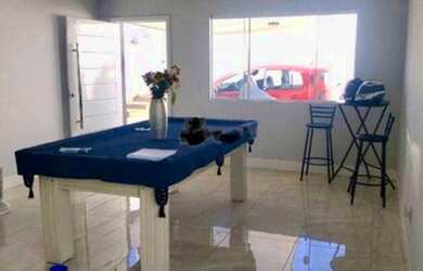 Imagem: A casa possui 4 Dormitórios, 5 Banheiros, 5 Vagas na garagem