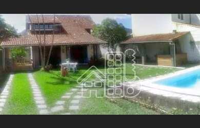 Imagem: A casa possui 3 Dormitórios, 1 Banheiro, 3 Vagas na garagem