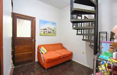 Imagem 11: Casa com três dormitórios com patio grande no bairro Santa Tereza