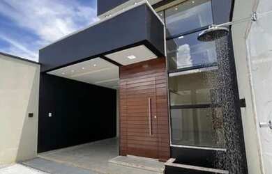 Imagem: A casa possui 3 Dormitórios, 3 Banheiros, 4 Vagas na garagem