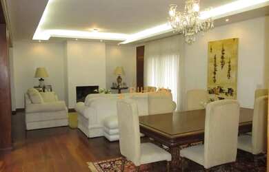 Imagem: A casa possui 5 Dormitórios, 5 Banheiros, 5 Vagas na garagem