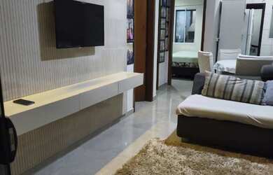 Imagem: A casa possui 2 Dormitórios, Acomodam 9 pessoas, 2 Vagas na