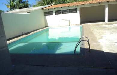 Imagem: A casa possui 3 Dormitórios, 5 Banheiros e está localizado