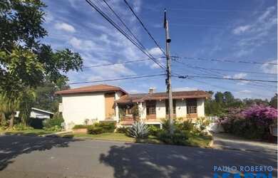 Imagem: A casa em condomínio à venda possui 5 Dormitórios, 5 Banheiros