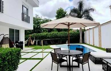 Imagem: A casa em condomínio possui 3 Dormitórios, 5 Banheiros, 5