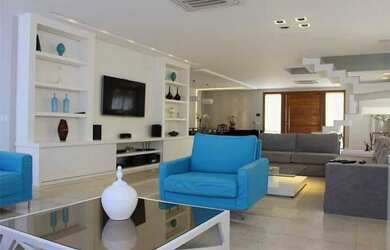 Imagem: A casa em condomínio possui 4 Dormitórios, 5 Banheiros, 3