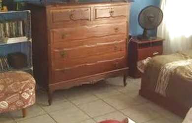 Imagem: A casa possui 3 Dormitórios, 1 Banheiro, 3 Vagas na garagem