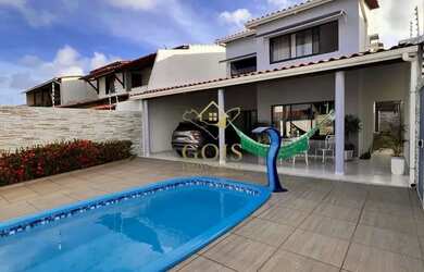 Imagem: A casa possui 4 Dormitórios, 5 Banheiros, 4 Vagas na garagem