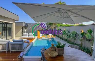 Imagem: A casa em condomínio à venda possui 4 Dormitórios, 5 Banheiros