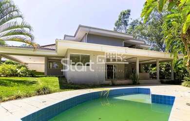 Imagem: A casa em condomínio possui 4 Dormitórios, 5 Banheiros, 5