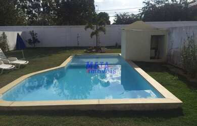 Imagem: A casa em condomínio possui 5 Dormitórios, 5 Banheiros, 4