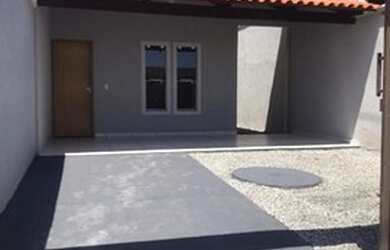 Imagem: A casa possui 3 Dormitórios, 2 Banheiros, 3 Vagas na garagem