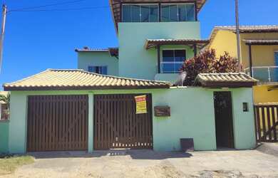 Imagem: A casa possui 3 Dormitórios, 2 Vagas na garagem e está localizado