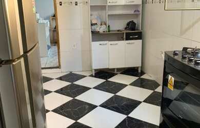 Imagem: A casa possui 2 Dormitórios, 1 Banheiro, 2 Vagas na garagem