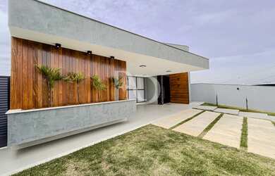 Imagem: A casa possui 4 Dormitórios, 5 Banheiros, 2 Vagas na garagem