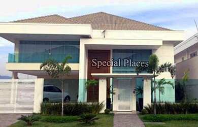 Imagem: A casa em condomínio possui 5 Dormitórios, 5 Banheiros, 4