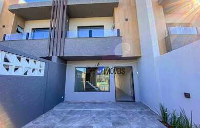 Imagem: A casa possui 3 Dormitórios, 2 Banheiros, 1 Vaga na garagem