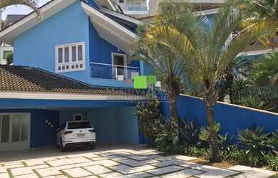 Imagem: A casa em condomínio possui 5 Dormitórios, 5 Banheiros, 5