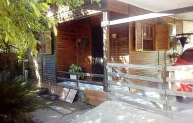 Imagem: A casa possui 2 Dormitórios, 1 Banheiro, 1 Vaga na garagem