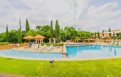 Imagem: A casa possui 3 Dormitórios, 4 Banheiros, 4 Vagas na garagem