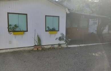 Imagem: A casa possui 2 Dormitórios, 1 Vaga na garagem e está localizado