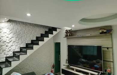 Imagem: A casa possui 3 Dormitórios, 4 Banheiros, 2 Vagas na garagem