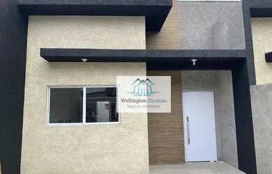 Imagem: A casa possui 3 Dormitórios, 2 Banheiros, 2 Vagas na garagem