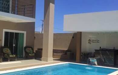 Imagem: A casa em condomínio possui 4 Dormitórios, 5 Banheiros, 3