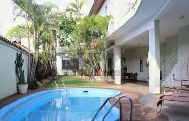 Imagem: A casa possui 5 Dormitórios, 5 Banheiros, 4 Vagas na garagem