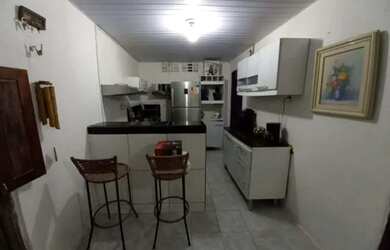 Imagem: A casa possui 2 Dormitórios, 1 Banheiro, 1 Vaga na garagem