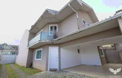 Imagem: A casa possui 3 Dormitórios, 3 Banheiros, 2 Vagas na garagem