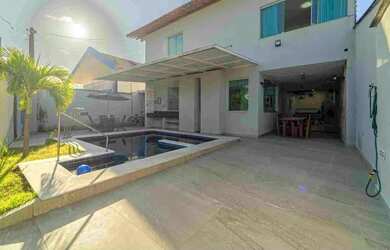 Imagem: A casa possui 5 Dormitórios, 4 Banheiros, 5 Vagas na garagem